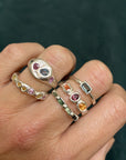4 upside-down Australian baguette sapphires Wobbly Band