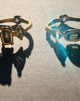 Green Australian Octagon set North/South and cheeky bottom sapphire