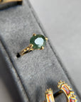 Large Jade Green Sapphire solitaire with a cheeky bottom