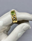 Large grass green sapphire with small Sapphires 1/2 Cigar