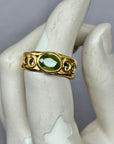 Large grass green sapphire with small Sapphires 1/2 Cigar