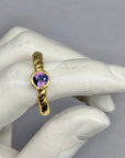 Tress Ring with a rare Winza sapphire