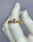 Tress Ring with a rare Winza sapphire