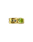 Large grass green sapphire with small Sapphires 1/2 Cigar
