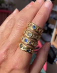 Large grass green sapphire with small Sapphires 1/2 Cigar