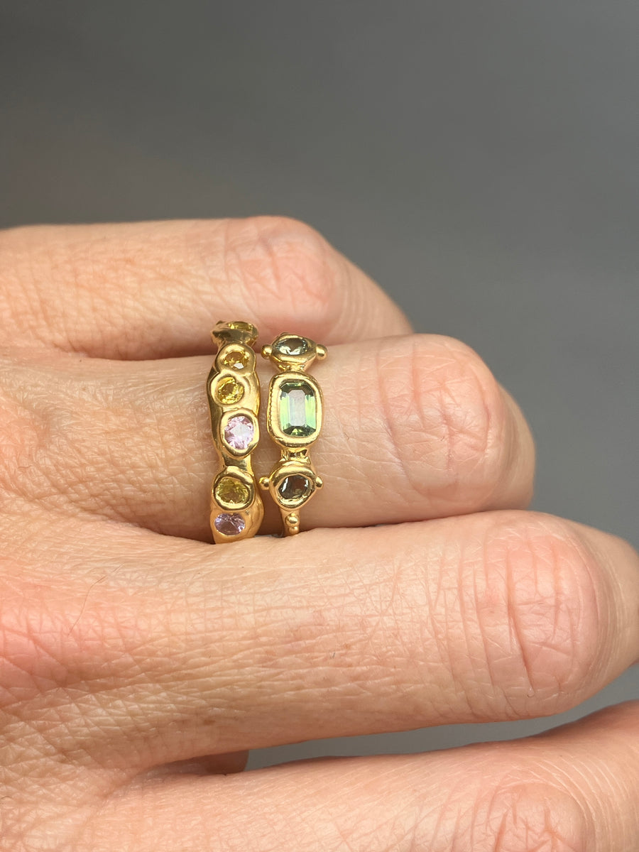 Green Australian Octagon, and round sapphires, and cheeky bottom sapphire