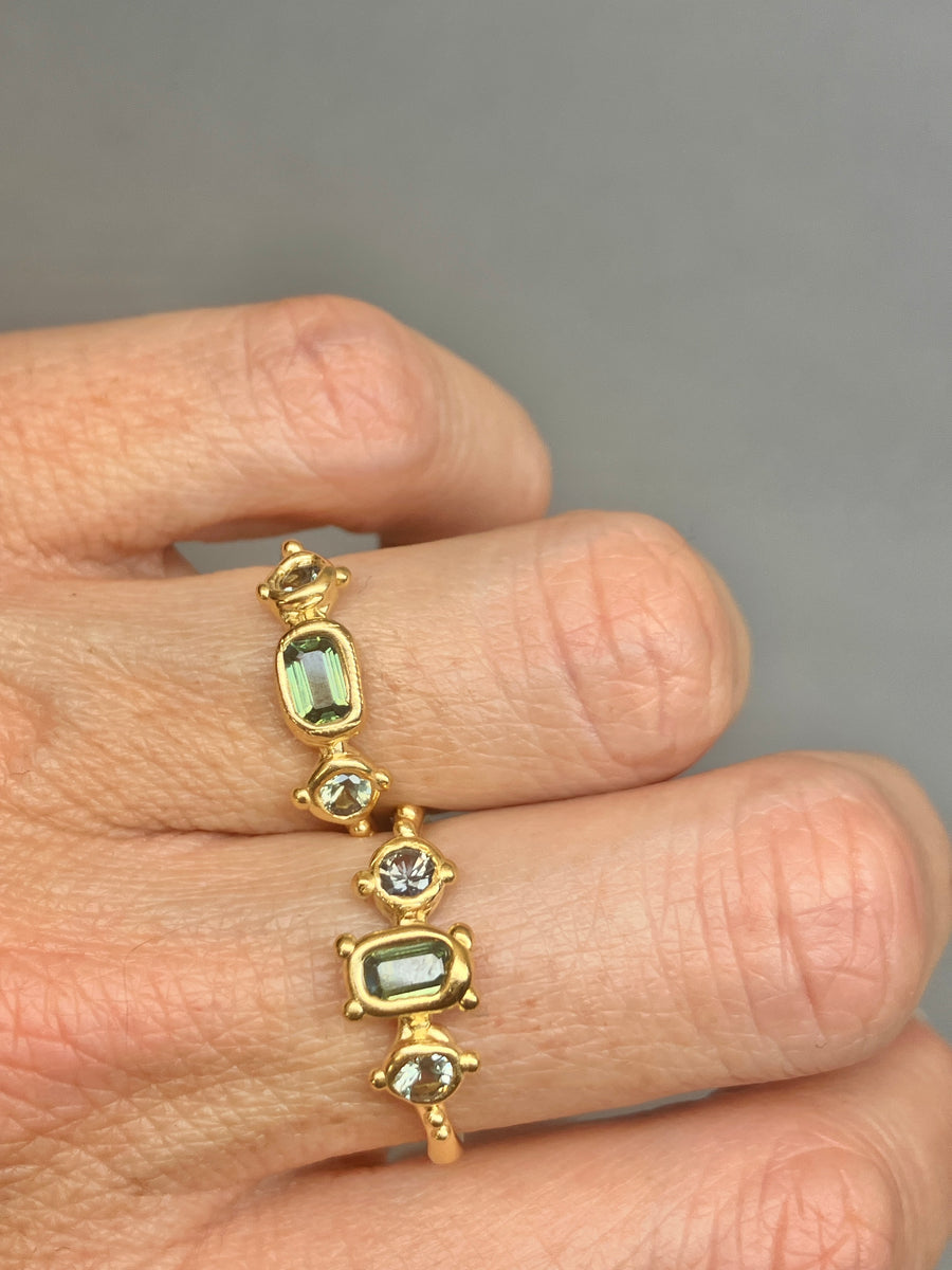 Green Australian Octagon, and round sapphires, and cheeky bottom sapphire