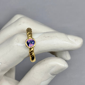 Tress Ring with a rare Winza sapphire