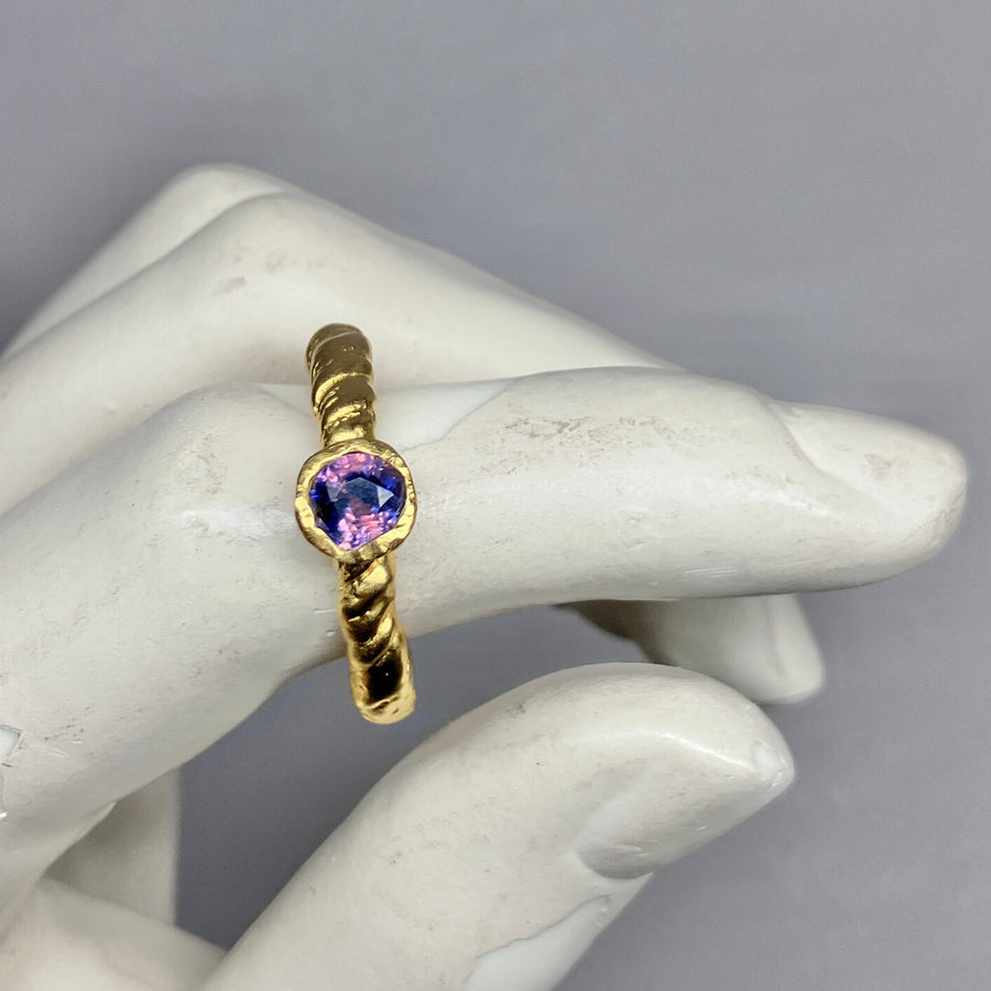 Tress Ring with a rare Winza sapphire