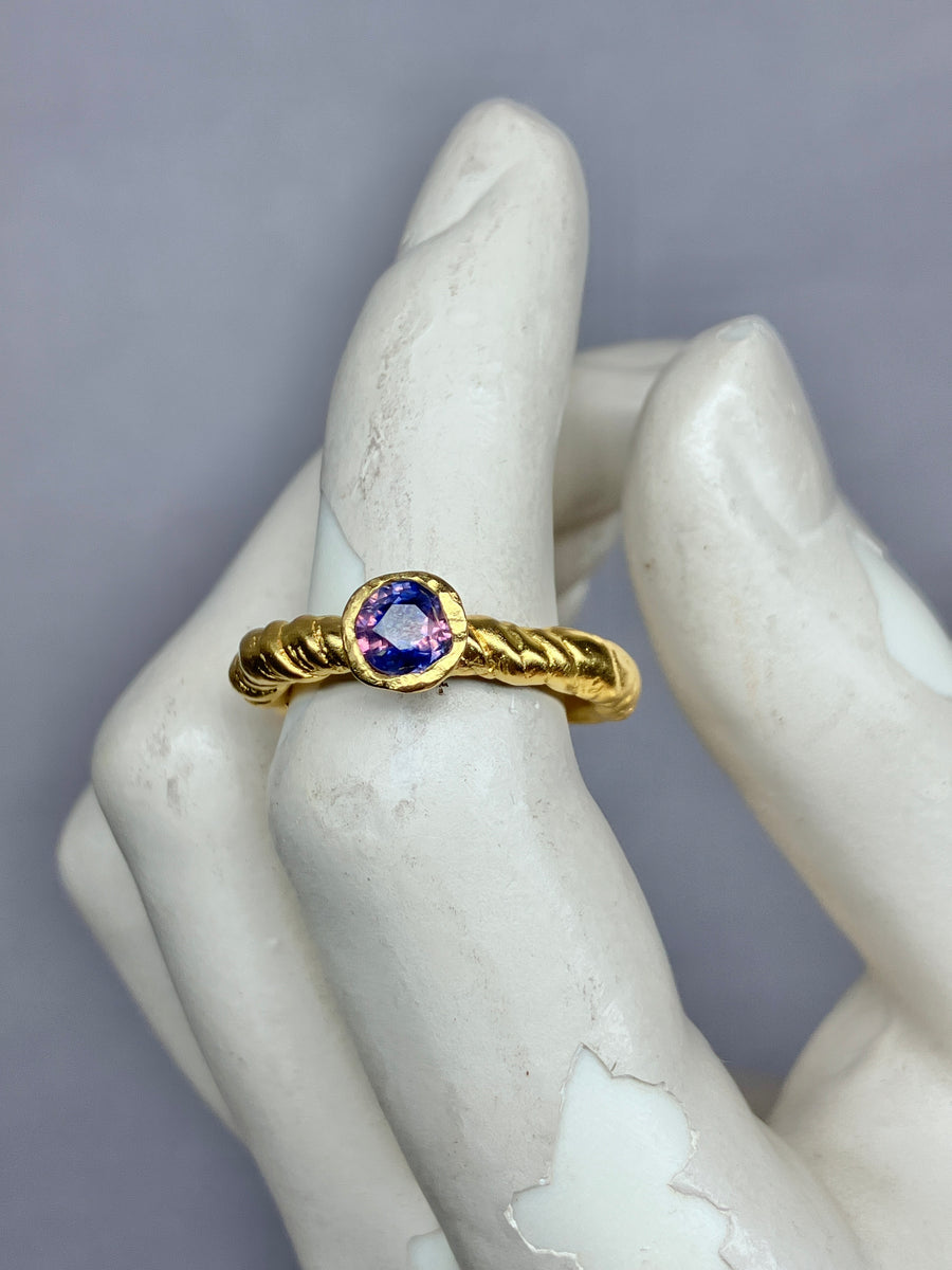 Tress Ring with a rare Winza sapphire