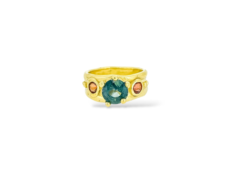 Radiant teal and orange sapphire ring