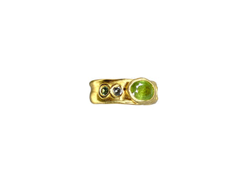 Large grass green sapphire with small Sapphires 1/2 Cigar