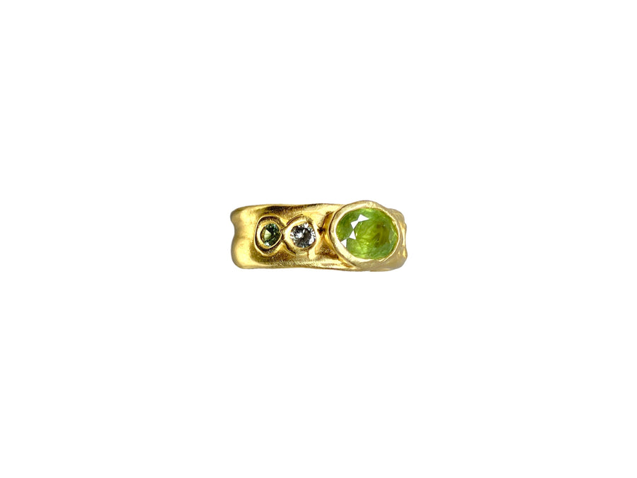 Large grass green sapphire with small Sapphires 1/2 Cigar